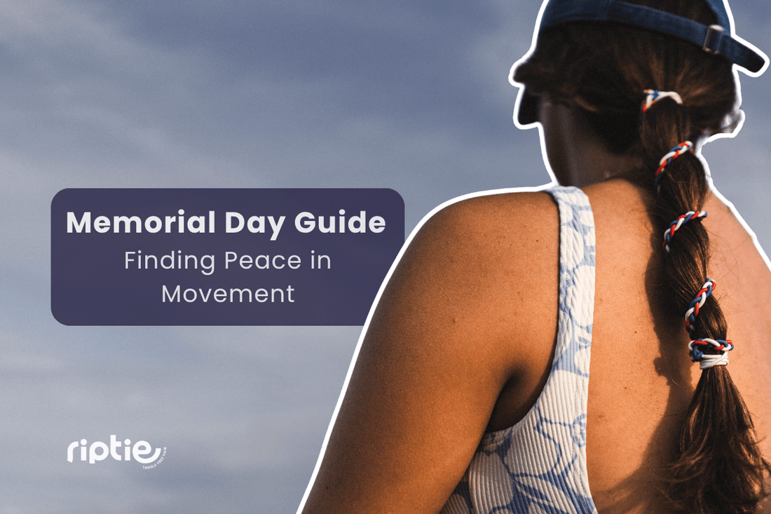 Woman pausing in quiet reflection outdoors on Memorial Day, hair secured with a Freedom Trail Rip Tie hair tie.