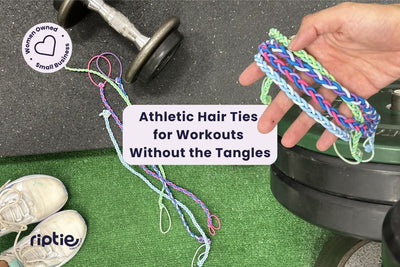 Woman with athletic hairtie running outdoors showing a no-tangle workout hairstyle