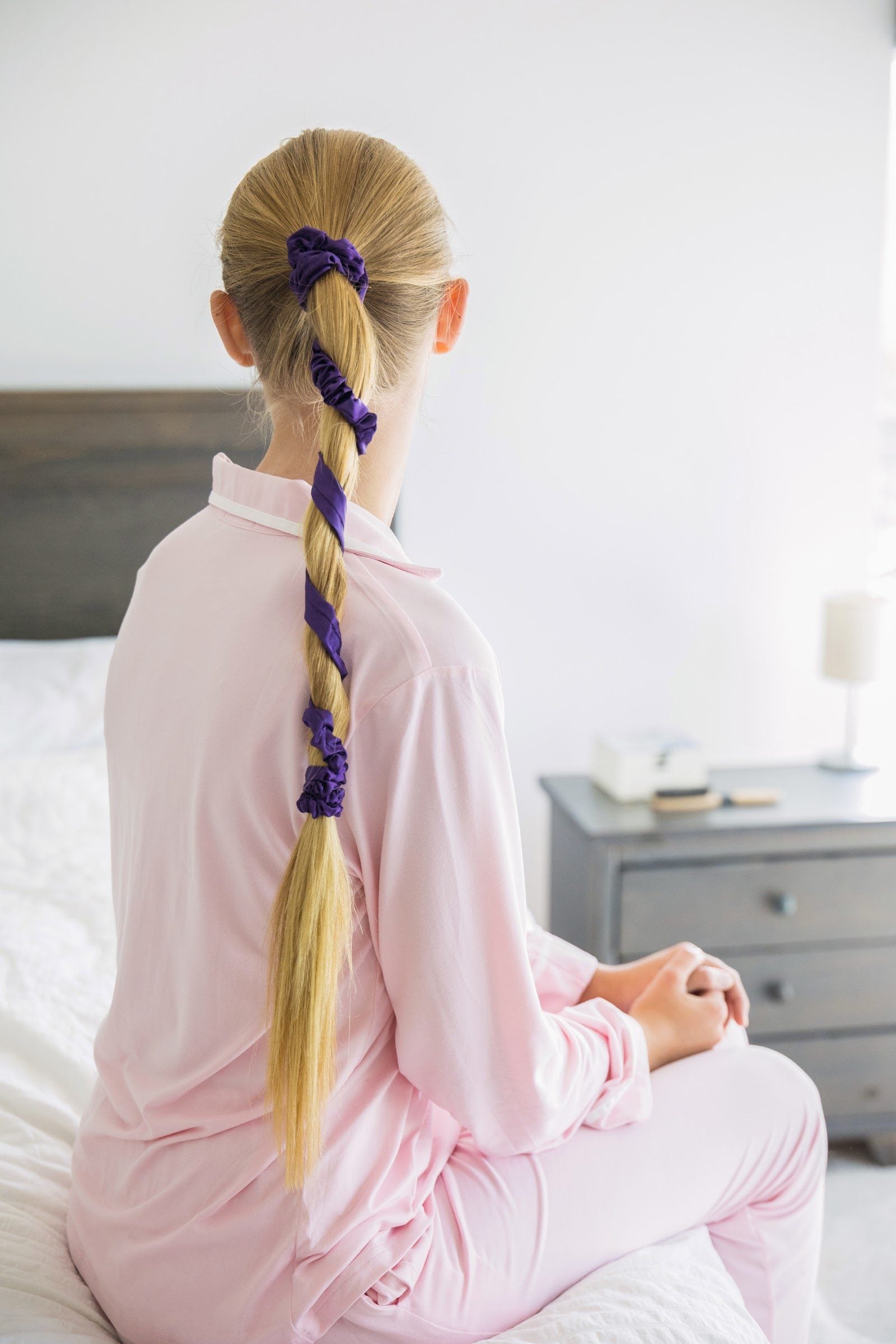 Long hair wrapped in a Midnight Haze Slumber tie, ready for bed